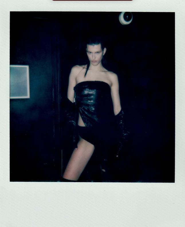 Direct-flash fashion portrait in a black dress
